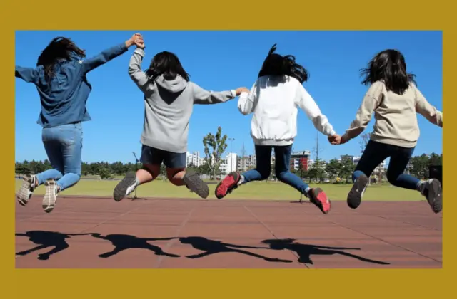 bordered image of smiling female students